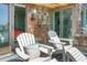 Relax on the porch in these comfy adirondack chairs overlooking the ocean view at 4319 Sea Forest Dr, Kiawah Island, SC 29455