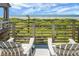 Enjoy the ocean view from this beautiful deck and relax on the comfortable seating at 4319 Sea Forest Dr, Kiawah Island, SC 29455