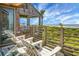 Relax on the deck with ocean views and comfortable seating, perfect for enjoying the coastal breeze at 4319 Sea Forest Dr, Kiawah Island, SC 29455