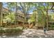 Unique condo complex with multiple decks and balconies shaded by mature trees for a relaxed coastal living experience at 4319 Sea Forest Dr, Kiawah Island, SC 29455