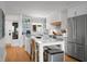 Spacious and modern kitchen with stainless steel appliances, a breakfast bar, and ample counter space at 4319 Sea Forest Dr, Kiawah Island, SC 29455