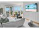 Open-concept living room with ocean views and comfortable seating arrangements at 4319 Sea Forest Dr, Kiawah Island, SC 29455