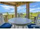 Spacious porch with table set, overlooking the ocean view at 4319 Sea Forest Dr, Kiawah Island, SC 29455