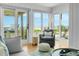 Cozy sitting area with water views, perfect for relaxing and enjoying the scenery at 4319 Sea Forest Dr, Kiawah Island, SC 29455