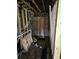 A bare room with exposed studs, unfinished floors, and visible plumbing, offering a blank canvas for customization at 436 W Butternut Rd, Summerville, SC 29483