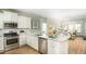 Bright, spacious kitchen with stainless steel appliances, granite countertops, and an open floor plan at 538 Richfield Way, Summerville, SC 29486