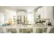 Kitchen with stainless steel appliances and a large island with seating for four at 538 Richfield Way, Summerville, SC 29486