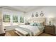 Bright main bedroom featuring large windows and elegant decor at 538 Richfield Way, Summerville, SC 29486
