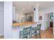 Kitchen with breakfast bar offers wood countertop, seating, and stainless steel appliances at 607 Jungle Rd, Edisto Beach, SC 29438