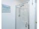 Updated walk-in shower with a glass door and mounted shower head at 607 Jungle Rd, Edisto Beach, SC 29438