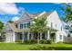 Side view of a lovely home with a well-manicured lawn and lush landscaping at 8009 Indian Hill Dr, Hanahan, SC 29410