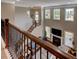 Overhead view of an elegant living room showcasing a fireplace and staircase at 8009 Indian Hill Dr, Hanahan, SC 29410