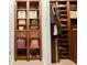 Custom closet featuring built-in shelves and hanging space for optimal organization at 8009 Indian Hill Dr, Hanahan, SC 29410