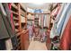 Walk-in closet with custom shelves, drawers, and hanging racks for optimal organization at 8009 Indian Hill Dr, Hanahan, SC 29410