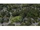 Aerial view highlighting the property lines, surrounded by lush greenery and established neighborhood at 8661 Laurel Grove Ln, North Charleston, SC 29420