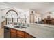 Kitchen view with granite countertops, stainless appliances, and an arched window at 8661 Laurel Grove Ln, North Charleston, SC 29420