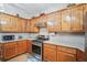 Kitchen features stainless appliances, granite countertop, and wood cabinets at 8661 Laurel Grove Ln, North Charleston, SC 29420