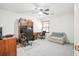 Office space features a work area, comfortable seating, ceiling fan, and natural light at 8661 Laurel Grove Ln, North Charleston, SC 29420