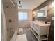 Bathroom featuring tile shower and wainscoting with a modern vanity and sink at 912 Kincade Dr Dr, Mount Pleasant, SC 29464
