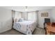 Cozy bedroom features a bed, two windows providing natural light, and a wardrobe at 912 Kincade Dr Dr, Mount Pleasant, SC 29464