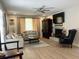 Bright living room featuring a brick fireplace, flat screen TV, and comfortable seating area at 912 Kincade Dr Dr, Mount Pleasant, SC 29464