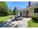 Beautiful outdoor space with patio and seating, lawn and additional structure with solar panels at 1001 Foxcroft Rd, James Island, SC 29412