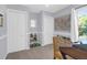 Bright bedroom featuring two closets, an organizer, a map, and a window with natural light at 1001 Foxcroft Rd, James Island, SC 29412
