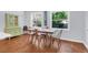 Charming dining room with hardwood floors, natural light, and a decorative hutch at 1001 Foxcroft Rd, James Island, SC 29412