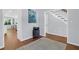 Hallway with hardwood floors, neutral walls, and natural light, leading to other rooms in the home at 1001 Foxcroft Rd, James Island, SC 29412