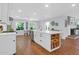 Spacious kitchen with island, farmhouse sink, and ample cabinet space at 1001 Foxcroft Rd, James Island, SC 29412