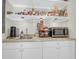 Pantry area with sink, ample counter space, and organized shelving for storage at 1001 Foxcroft Rd, James Island, SC 29412