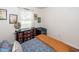 A cozy bedroom features neutral decor and a fan at 104 Clover St, Summerville, SC 29483