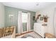 Charming Bedroom with a crib, changing table, and modern decor, creating a cozy and stylish space for a baby at 104 Clover St, Summerville, SC 29483
