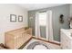 Sweet Bedroom featuring a crib, modern decor, and soft lighting, creating a comforting and stylish environment for a baby at 104 Clover St, Summerville, SC 29483
