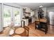 Well-lit kitchen featuring white cabinetry, stainless steel appliances, and a butcher block island at 104 Clover St, Summerville, SC 29483