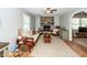 Inviting living room with stone fireplace, natural light, and ample seating at 104 Clover St, Summerville, SC 29483