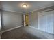 Bright bedroom featuring large closet, neutral walls, carpet floors and bright natural light at 106 Pelican St, Ladson, SC 29456