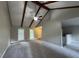 Bright living room with a vaulted ceiling, neutral paint, and staircase to the second floor at 106 Pelican St, Ladson, SC 29456