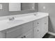 Bathroom with dual sinks, a spacious vanity, and modern fixtures at 109 Wisteria Ct, Summerville, SC 29486