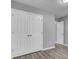 Bedroom featuring modern flooring, neutral paint, closet, and doorway at 109 Wisteria Ct, Summerville, SC 29486
