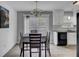 Dining area featuring modern flooring, neutral wall color, and a sliding glass door for natural light at 109 Wisteria Ct, Summerville, SC 29486