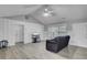 Bright living room with vaulted ceiling, modern flooring, and paneled walls for a cozy feel at 109 Wisteria Ct, Summerville, SC 29486