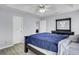 Comfortable main bedroom with neutral colors, ceiling fan, modern flooring, and ample closet space at 109 Wisteria Ct, Summerville, SC 29486