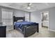 Relaxing main bedroom with a tray ceiling, modern flooring, and ensuite bathroom at 109 Wisteria Ct, Summerville, SC 29486