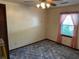 Standard bedroom with a ceiling fan, window and carpet flooring at 111 Craven Rd, Ladson, SC 29456