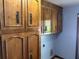These are wooden cabinets with matching hardware in the kitchen at 111 Craven Rd, Ladson, SC 29456