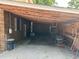 Carport area with gravel and exposed rafters at 111 Craven Rd, Ladson, SC 29456