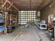 Spacious garage with plenty of room for storage with a translucent wall at 111 Craven Rd, Ladson, SC 29456