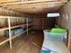 View of the interior storage room with open shelving and pegboard at 111 Craven Rd, Ladson, SC 29456