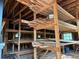 Rustic storage area with wooden shelving and natural light from the windows at 111 Craven Rd, Ladson, SC 29456